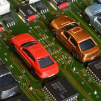 How are carmakers rebuilding the vehicle’s electronic brain?